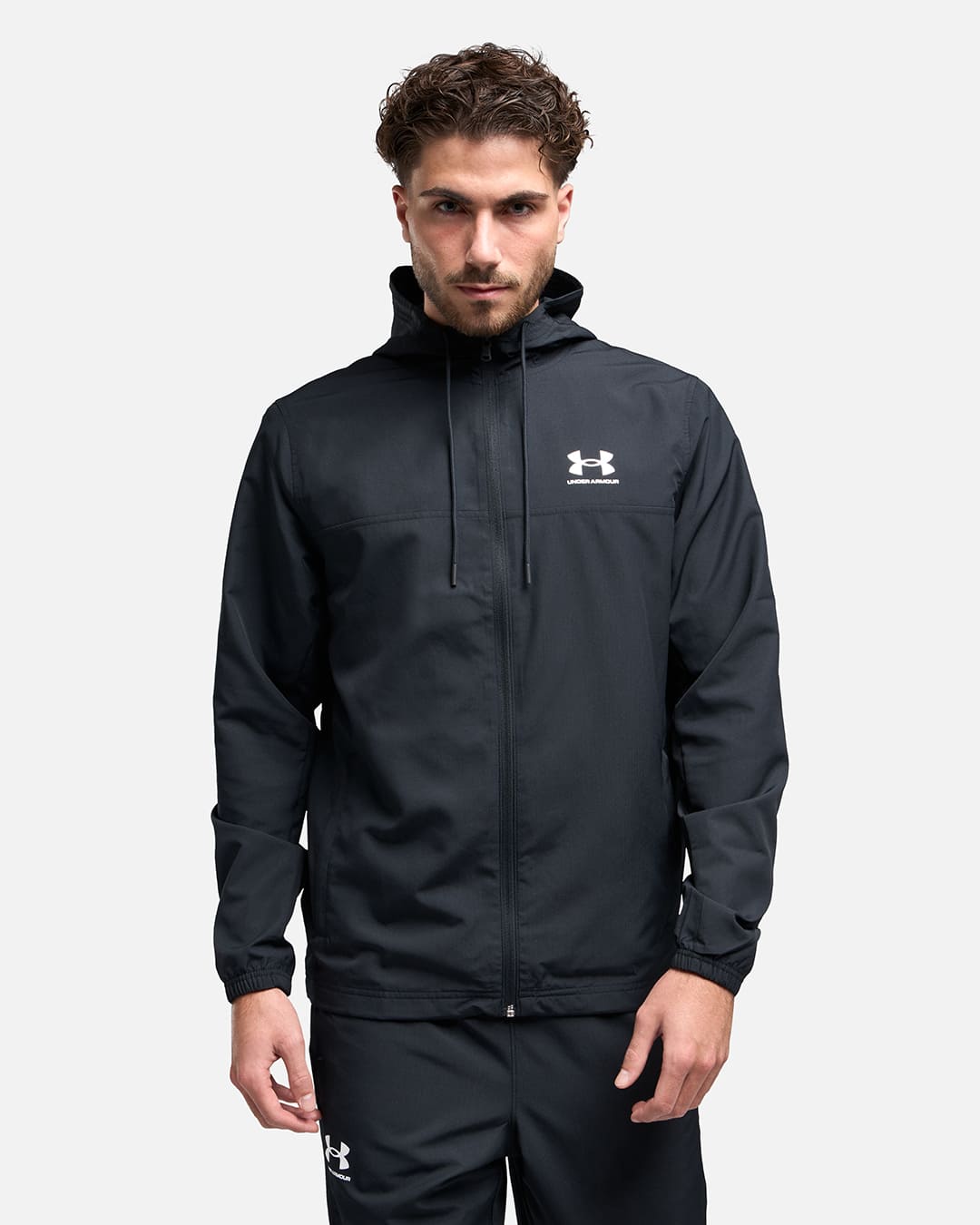 Chaqueta Under Armour Rival Woven - Negro